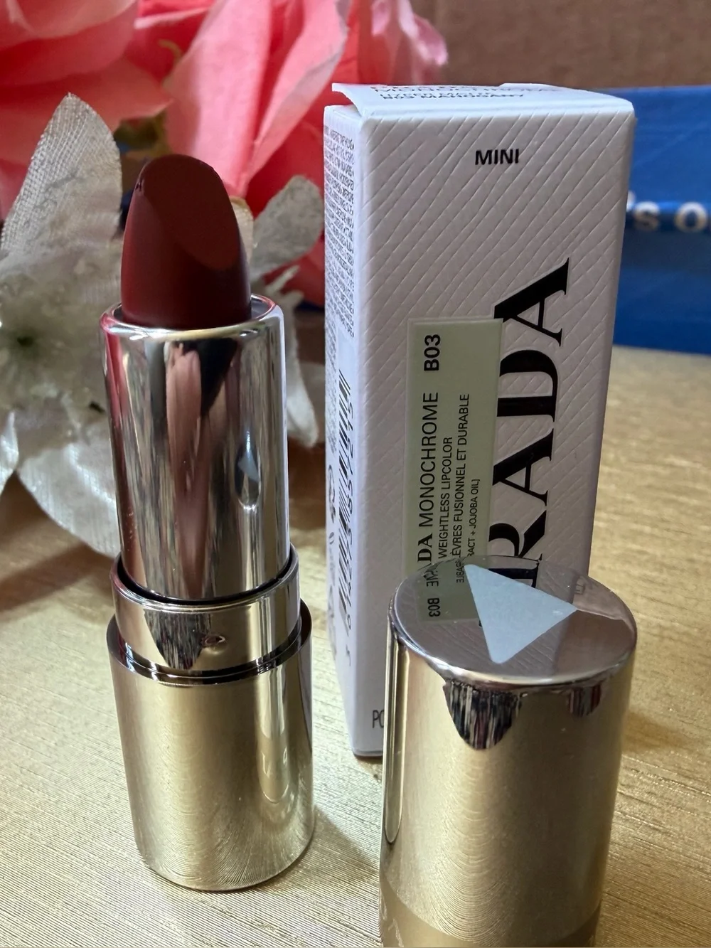 Prada Monochrome Hyper Matte lipstick in B03 Mahogany. MINI size. 0.04oz